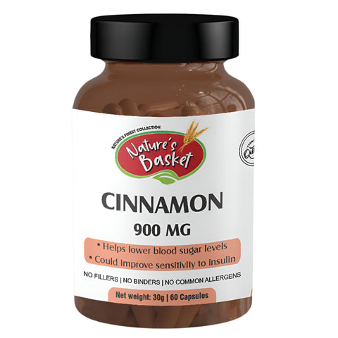 A bottle of Nature's Basket Cinnamon 900 MG capsules, with 60 capsules inside. The label indicates that the product is blood sugar support and antioxidant supplement.